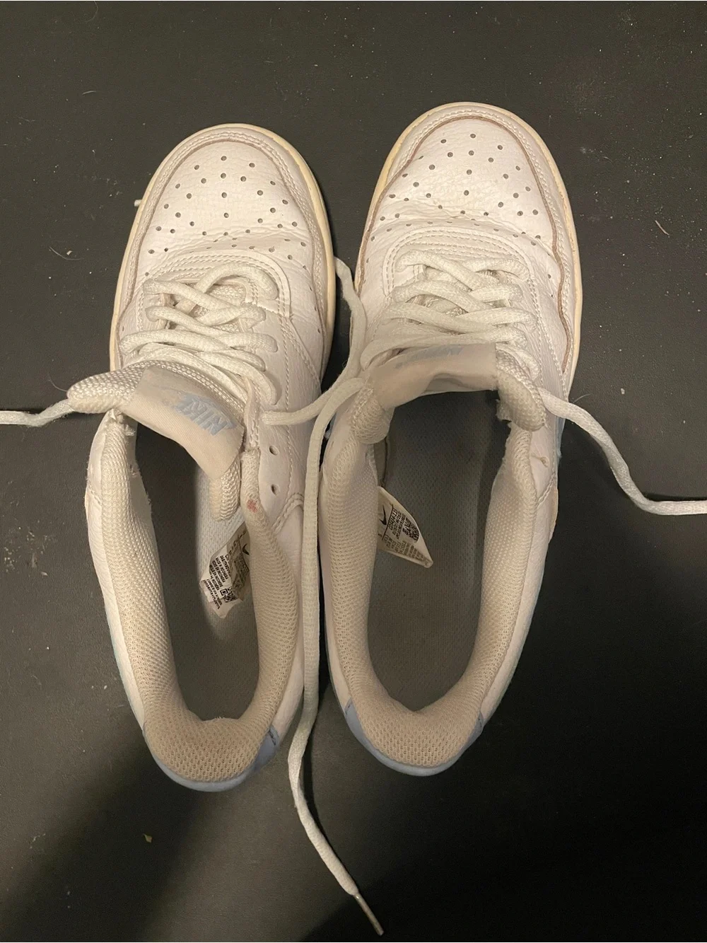 Nike White Low-Top Sneakers with Light Blue Swoosh
